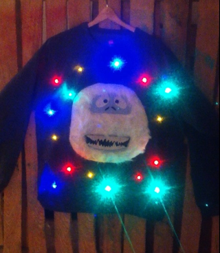 Illustration for article titled 8 Awesome* Teched-Out Christmas Sweaters